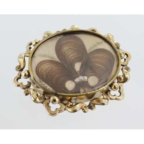 401 - Yellow metal mourning brooch/pendant with hair and pearls and decorative frame, approx. 6cm x 4.5cm,... 