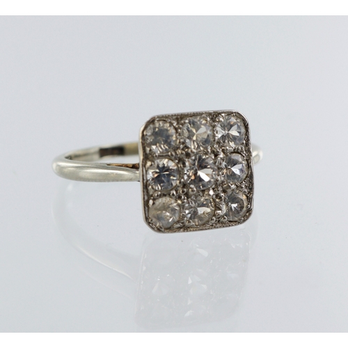 41 - White metal (stamped 18ct and platinum) square pave set cz ring, set with nine simulated diamonds, f... 