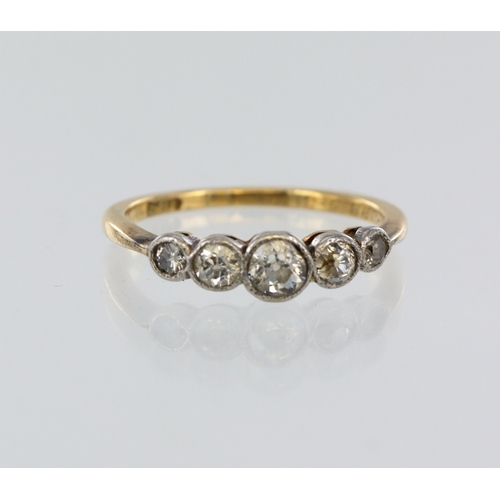 5 - Yellow metal (stamped 18ct) graduated diamond ring, five round old cuts, total diamond weight 0.33ct... 