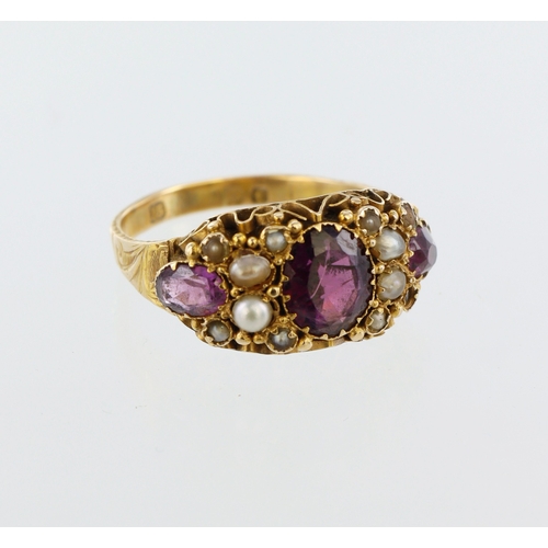 50 - 15ct yellow gold garnet and pearl ring, three graduated almandine garnets, twelve seed pearls, finge... 