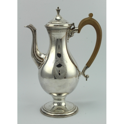 568 - Very well made modern silver coffee pot with wooden handle and bright-cut engraving, the pot is hall... 