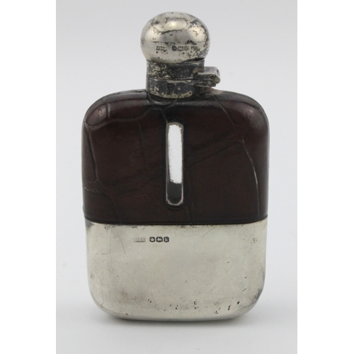 585 - Silver & leather hip flask, hallmarked 'James Dixon & Sons, Sheffield 1927', length 12cm approx.