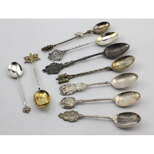 594 - Silver Teaspoons. A collection of nine silver souvenir teaspoons, including Bar Gate Southampton, Ro... 