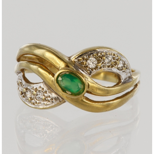 6 - 14ct yellow gold band ring set with an oval emerald in rub over setting, with three round cubic zirc... 