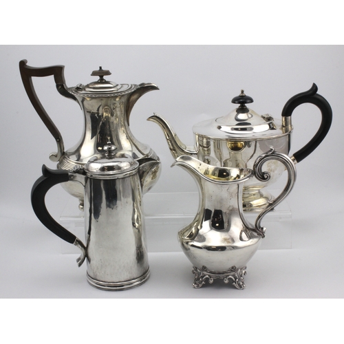 609 - Four silver hallmarked teapots, coffee pots and jugs, total weight 50oz. approx.