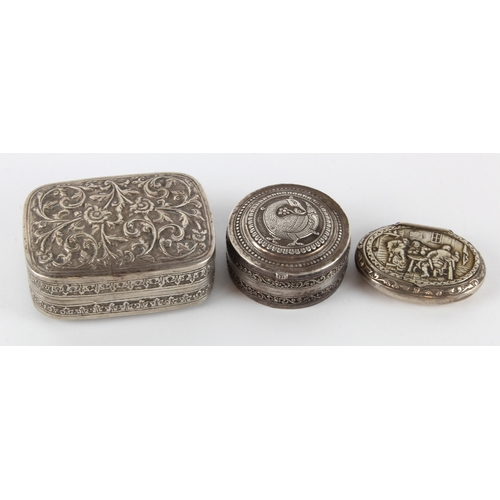 614 - Three white metal boxes, each with ornate decoration, largest height 35mm, width 90mm, depth 65mm ap... 