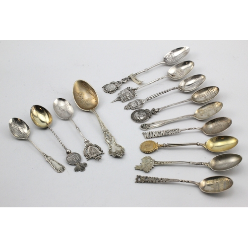 618 - Silver Teaspoons. A collection of thirteen silver souvenir teaspoons, relating to various Cathedrals... 