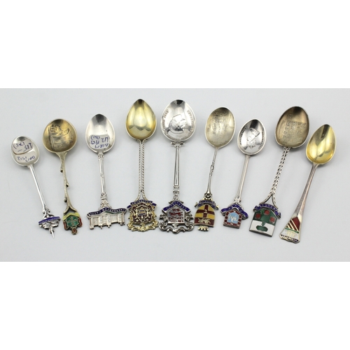 619 - Enamel Teaspoons. Nine silver & enamel souvenir teaspoons, all relating to UK destinations, includin... 