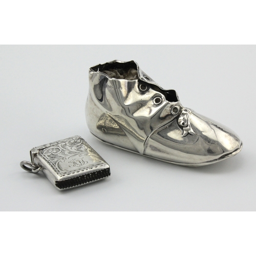 621 - Unusual crumpled silver shoe pin cushion, hallmarked L&S Birmingham 1907, with part of cushion missi... 