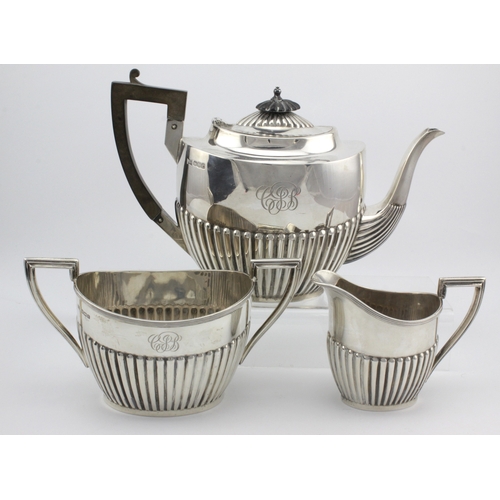 624 - Silver three piece tea set, comprising teapot, milk jug and sugar bowl, hallmarked 'Walker & Hall, S... 