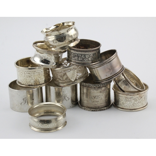 628 - Napkin Rings. A collection of twelve silver napkin rings (mostly hallmrked), silver weight 8.8oz. ap... 