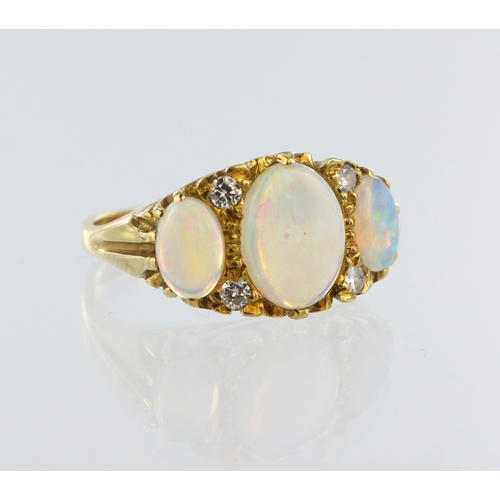 72 - 18ct yellow gold opal and diamond carved head ring, three oval graduated opal cabochons, four round ... 