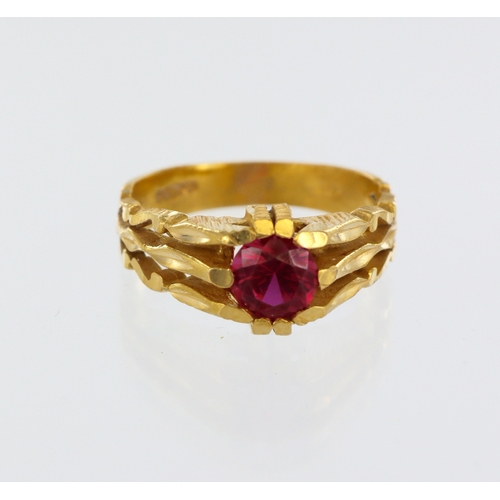 76 - 22ct yellow gold solitaire ring, round red paste srone, hallmarked London 1973, finger size M, weigh... 