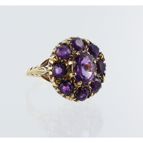 79 - 9ct yellow gold amethyst cluster dress ring, finger size O, weight 7.4g