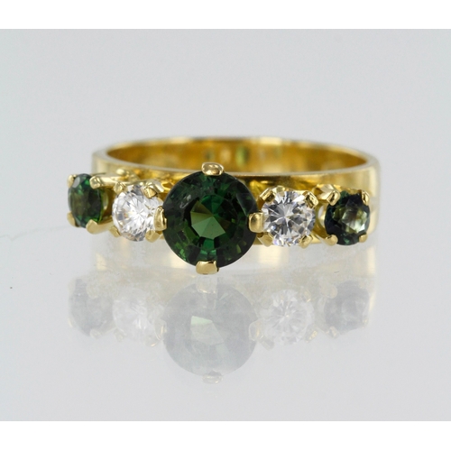 8 - Yellow gold (tests 18ct) green tourmaline and CZ dress ring, three round tourmalines principle measu... 