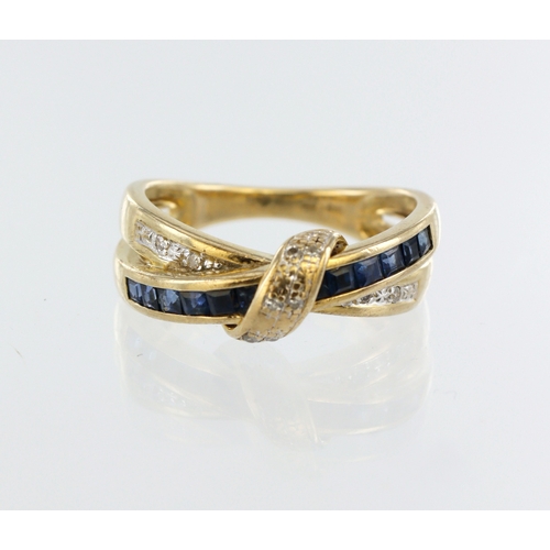 81 - 9ct yellow gold channel set sapphire and diamond band ring, twelve princess cut sapphires, ten round... 