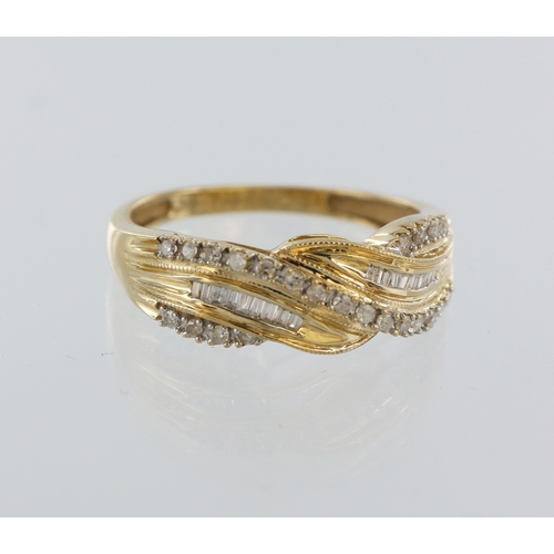 91 - 14ct yellow gold band ring set with twenty three round diamonds and baguette cut diamonds, total dia... 