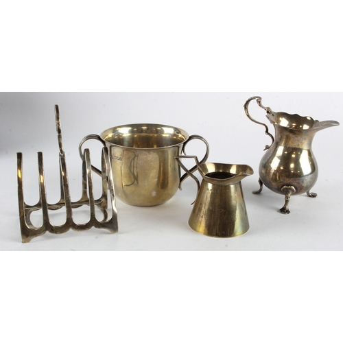 457 - Mixed Silver. Four various silver hallmarked items, comprising twin handled cup (Harrods), two milk ... 