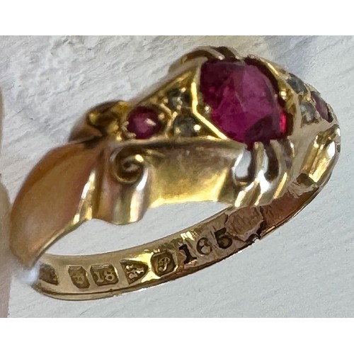 123 - 18ct yellow gold ruby and diamond ring, hallmarked Chester 1915, Three graduated rubies, four round ... 