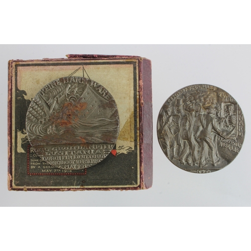 1050 - WWI Lusitania propaganda medals (2) EF, and VF with some rust, and an original box with detached lid... 