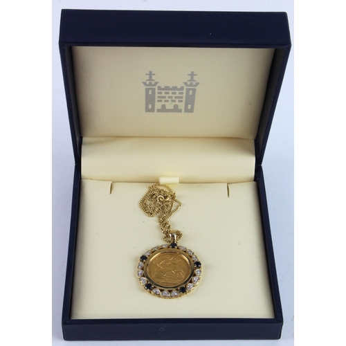 32 - Half Sovereign 1906 aVF in a jewelled 9ct gold mount and chain, cased.