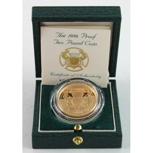 48 - Royal Mint: The 1986 (gold) Proof Two Pound Coin, FDC cased with cert. (0.4707 troy oz AGW)