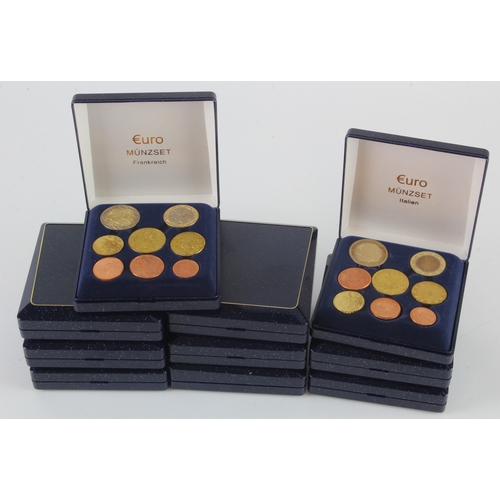 559 - Euro Coin Sets (10) in blue cases for following countries: Spain, Greece, Austria, Portugal, Finland... 