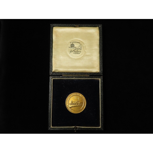 909 - British India Interest: (tests as) 18ct gold d.32mm, 23.97g: 'Indian Railway Conference Association,... 