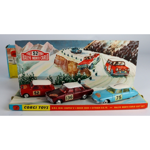 115 - Corgi Toys Gift Set, no. 38 'Rallye Monte Carlo', comprising B.M.C. Mini Cooper S, Rover 2000 & Citr... 