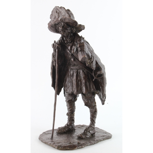 420 - Bronze. A patinated bronze figure of a frontersman with rifle and stave, signed at the base 'H. Saba... 