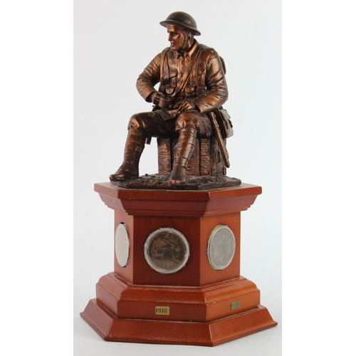 425 - Danbury Mint Limited Edition 'The Brave British Tommy' figure mounted on a wooden plinth with six co... 