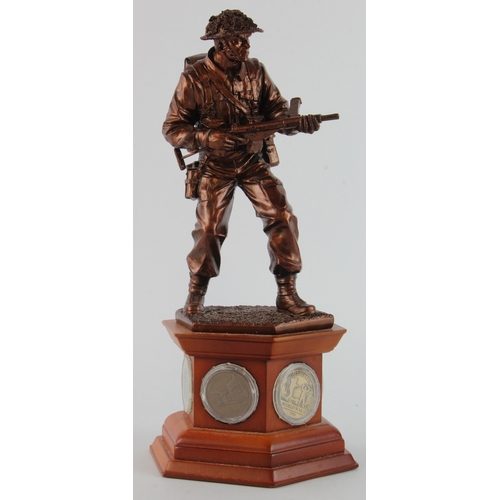 426 - Danbury Mint Limited Edition 'The Liberator' figure mounted on a wooden plinth with six coins inset,... 