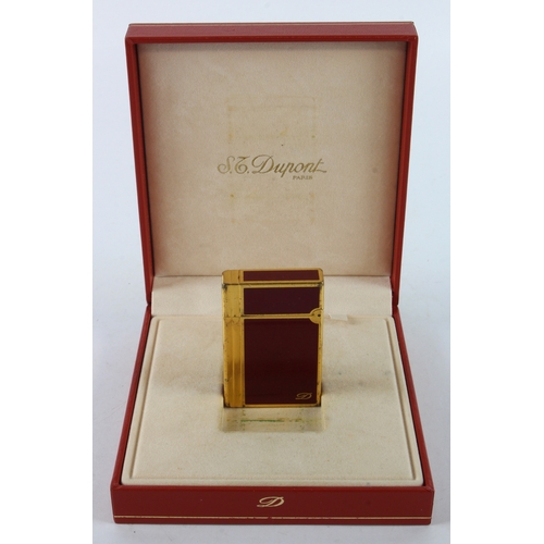 428 - Dupont. An S. T. Dupont red enamel lighter, contained in original fitted box