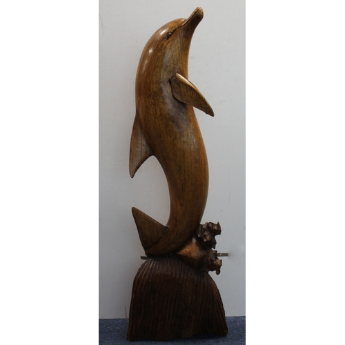 443 - Large carved wood statue depicting a dolphin. Height approx 100cm