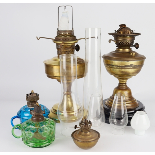 469 - Three brass oil lamps (two large and one small) plus two coloured glass oil lamps