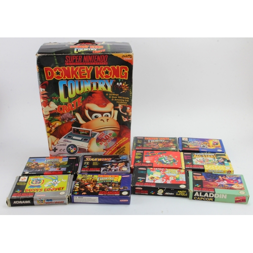 62 - Super Nintendo SNES collection, to include Donkey Kong Country Crate (scarce, comprising outer box, ... 