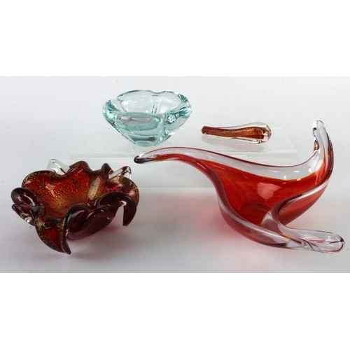 86 - Three glass bowls, including a clear glass bowl by Daum, a red & gold coloured glass pestle & mortar... 