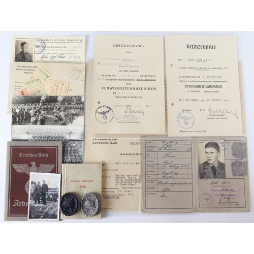 1068 - German WW2 group to Karl Baur 3./schnelle abt 387 comes with his wound badges in silver and black wi... 