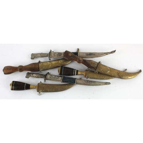 137 - Selection of vintage Indo Persian daggers with scabbards   (6)