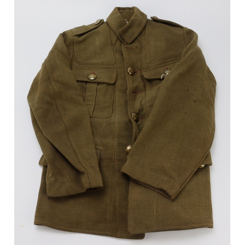 180 - 1922 pattern scarce child’s tunic dated 1944 and named to E Lewis Evans with Royal West Kent brass b... 