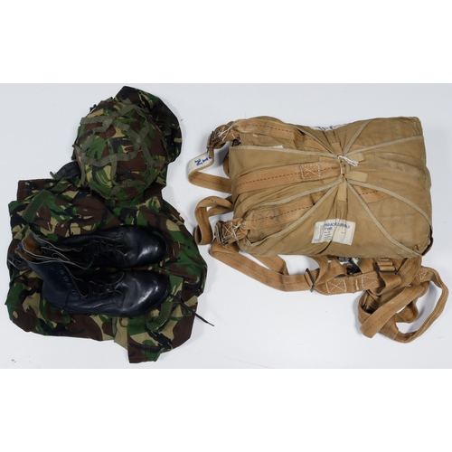 282 - British Parachute dated 1981 (Falklands era) seems complete, plus helmet and camo uniform, boots etc... 