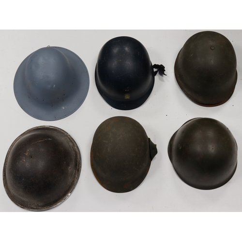 375 - Military Helmets - various types in a large yellow bag