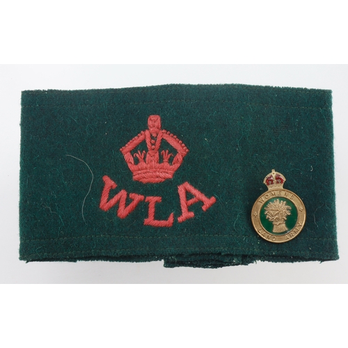 472 - Women’s Land Army Arm band and badge.