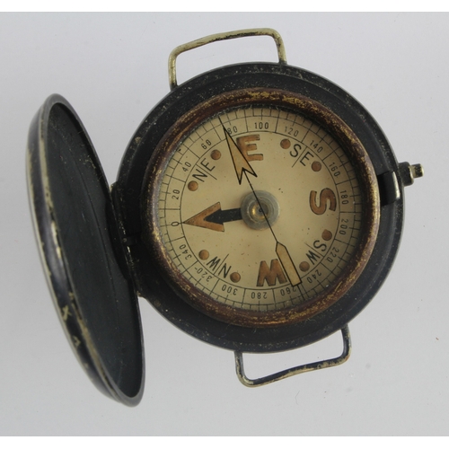 490 - WW1 era wrist compass, unmarked, but blackened for trench use