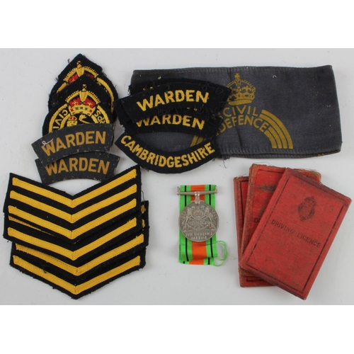 518 - WW2 Cambridgeshire ARP and Civil Defence cloth badges, Armband, Defence medal in box named to C Will... 