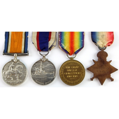 568 - 1915 trio with RN Fleet Long Service medal to J.9695 A Wookey PO RFR.