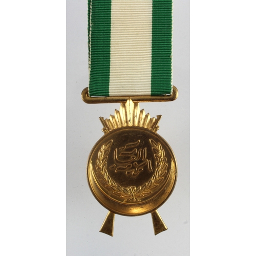 702 - Iraq King Faisal General service / war medal, later type.