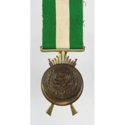 703 - Iraq King Faisals General service / war medal.