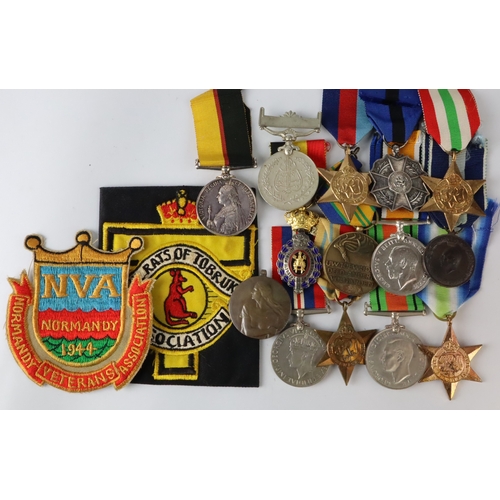 718 - Medals various including Africa Star, Defence & War Medal with a Rats of Tobruk Association blazer b... 