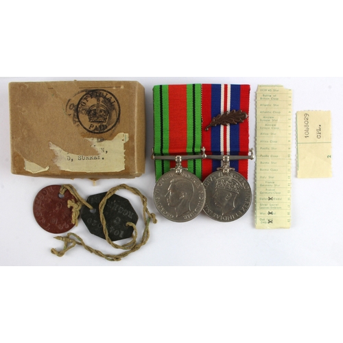 818 - WW2 group Defence & War Medal + Oak leaf mounted as worn with award slip, tikatape slip and IF Tags ... 